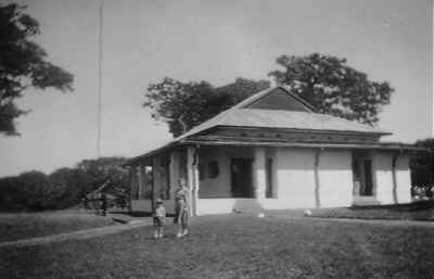 Mwinilunga Boma ca. 1951 Betty Dening and daughter Katherine are standing in front.